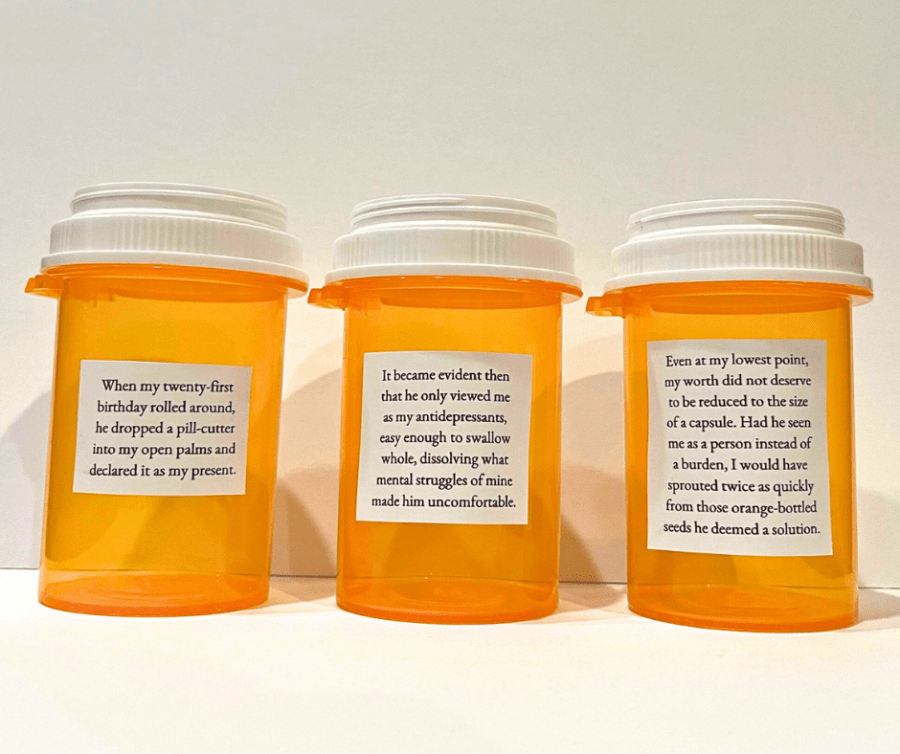 three empty translucent Orange pill bottles stand in a row, each bearing part of the poem's text